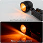 Black LED turn signal pair lit with bright amber beam effect