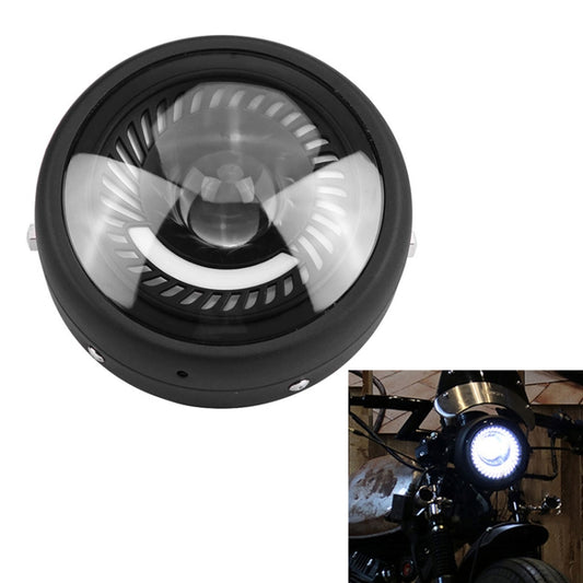 Black 5.75-inch retro motorcycle LED headlight with glowing central lens and vented grille