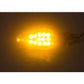 Amber LED turn signal light glowing behind triangular clear lens