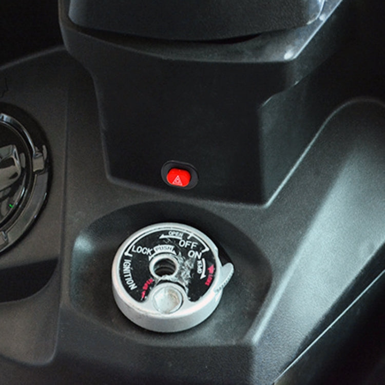 Motorcycle scooter dashboard warning switch with red button on round ignition panel