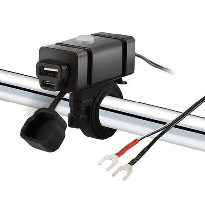 Black motorcycle phone charger with waterproof cover and two USB ports on handlebar clamp.