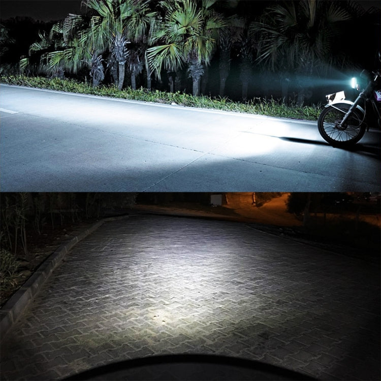 LED motorcycle headlight beam illuminating a paved road at night