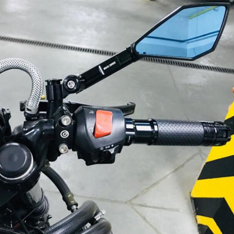 Mounted motorcycle rearview mirror with blue reflective lens on handlebar