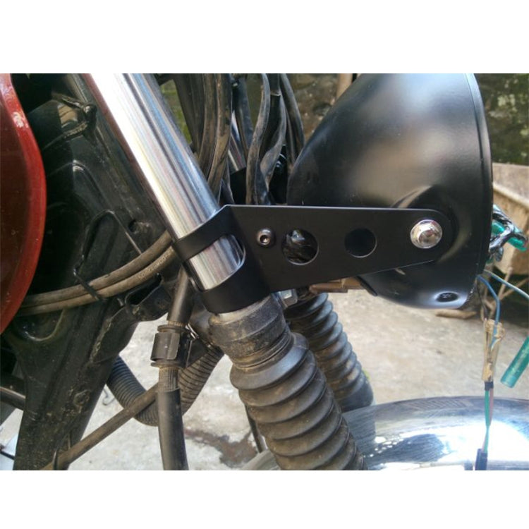 Motorcycle headlight mounting bracket, black metal strap with mounting bolts and holes