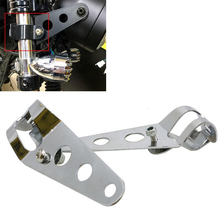 Silver motorcycle headlight mount bracket with round holes and bolt