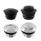 Flush pop-up motorcycle gas cap pair in black and silver with textured top