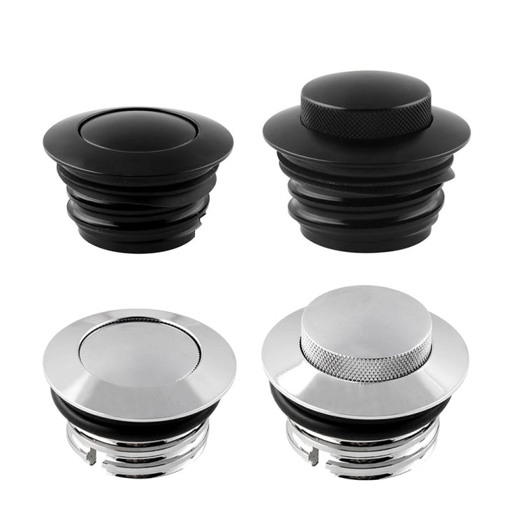 Flush pop-up motorcycle gas cap pair in black and silver with textured top