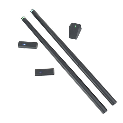 Virtual drum kit sensor sticks and small controller pads, dark with green indicator lights