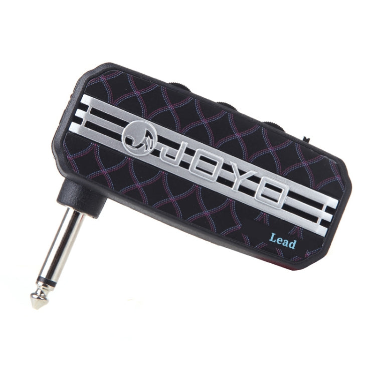 Black mini guitar lead distortion effects pedal with patterned cover and 1/4 in connector.