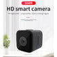 Black mini smart camera with front lens and side microphone/speaker holes