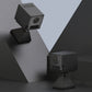 Black wireless action camera on compact stand with side bracket
