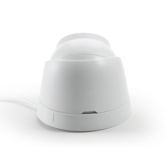 White dome security camera with base housing and cable connection on side.