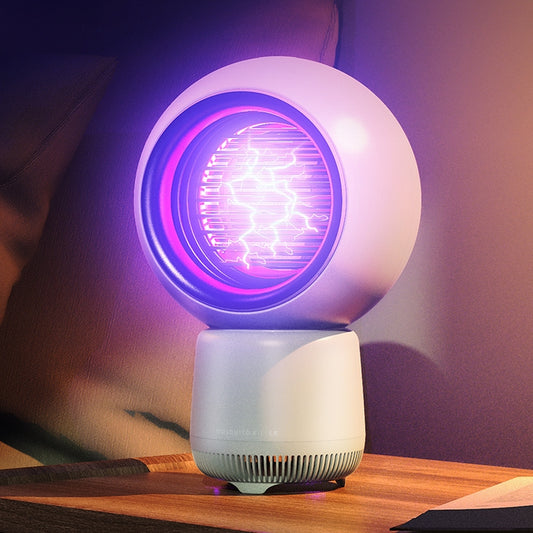 White round mosquito killer lamp with glowing purple UV grid and vented base