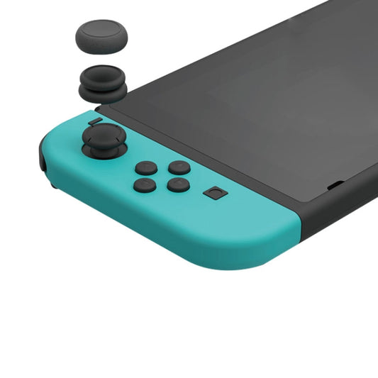 Rocker cap button cover shown installing on a teal Switch controller, black grips