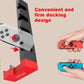 iPega Joy-Con charging dock stand with four slots and a hand inserting a Joy-Con