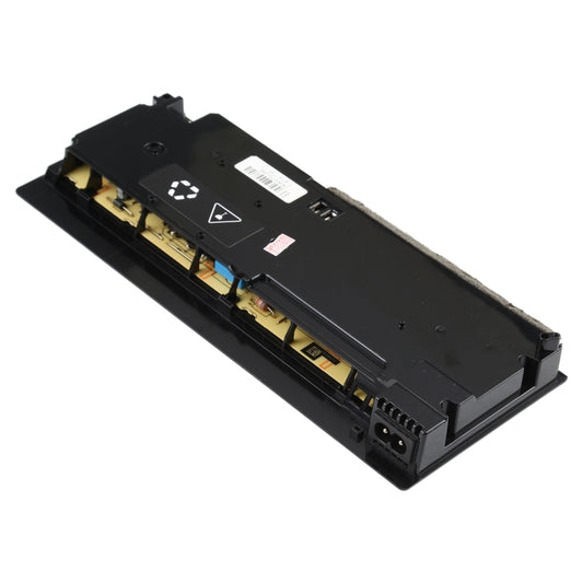 Black internal power supply unit with circuit board and connector slot