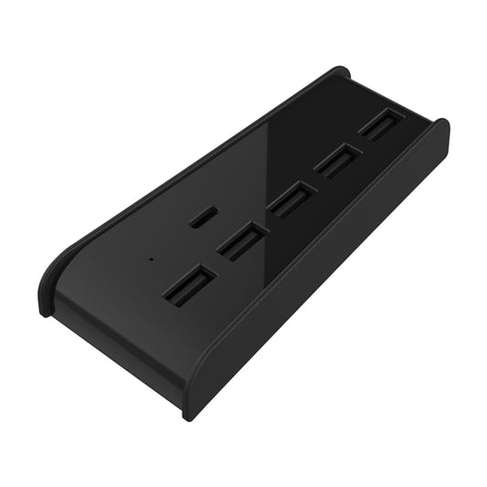 Black USB hub expander with multiple USB-A ports for connecting accessories