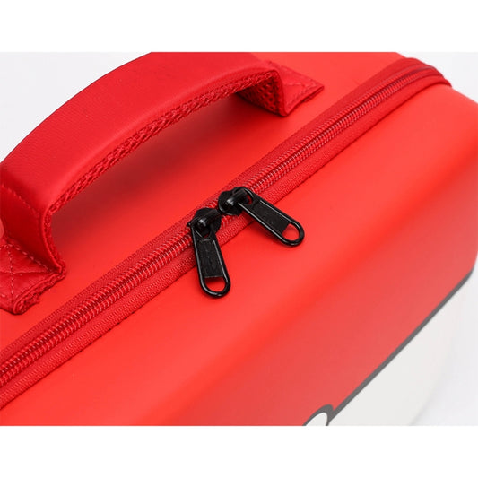 Red zippered top edge of the shoulder bag with black zipper pull and stitched trim.