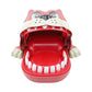 Front view of dog-shaped bite toy with open red mouth, white teeth, and pink ears.