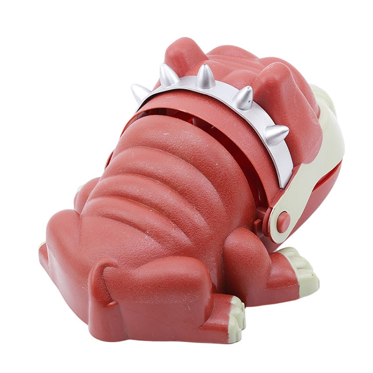 Side view of red dog bite toy with spiked back and pale cream jaw covering teeth.