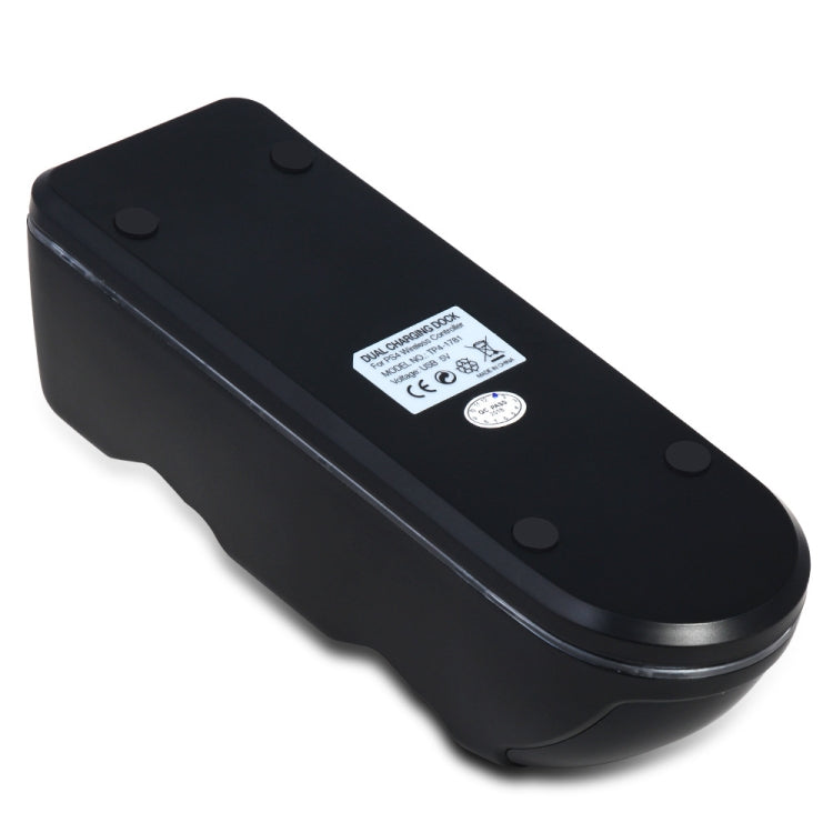 Black dual charging dock bottom with regulatory label and rubber feet