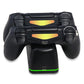Black game controller resting on dual charging dock with green LED strip