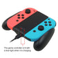 Coral and light blue Joy-Con grip charger with blue indicator light while charging