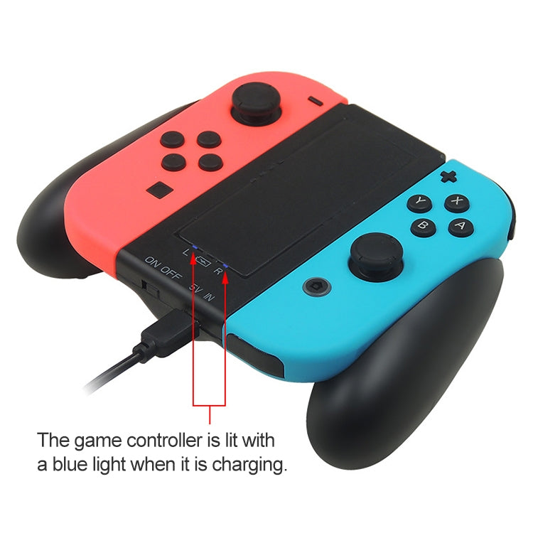Coral and light blue Joy-Con grip charger with blue indicator light while charging