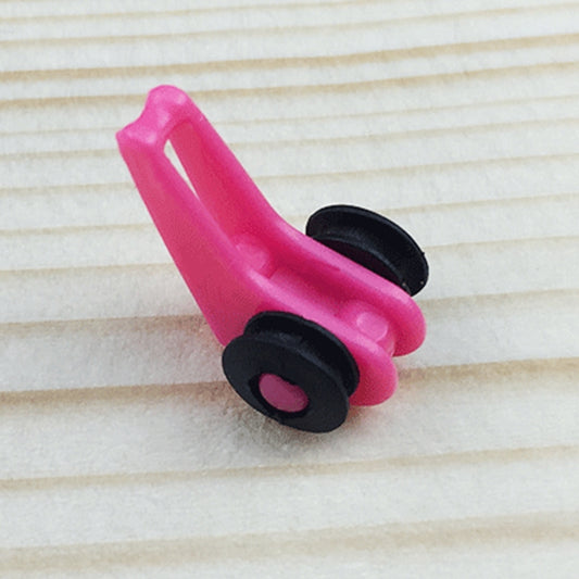 Pink plastic fishing rod hook keeper clip showing hook and black ring end
