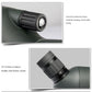 Monocular telescope focusing wheel and zoom ring detail on dark teal body.