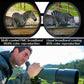 Monocular telescope in use outdoors, held up and aimed toward animals.