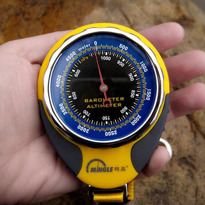 Yellow and black barometer altimeter watch with analog dial and compass markings.