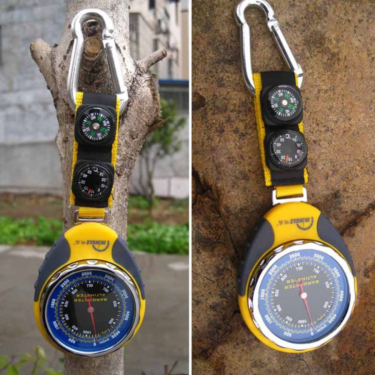 Yellow and black altimeter with compass and barometer dials, hanging outdoors.