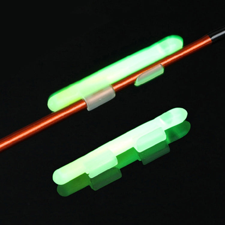 Clip-on luminous light sticks with green glow, mounted on rod tip clips