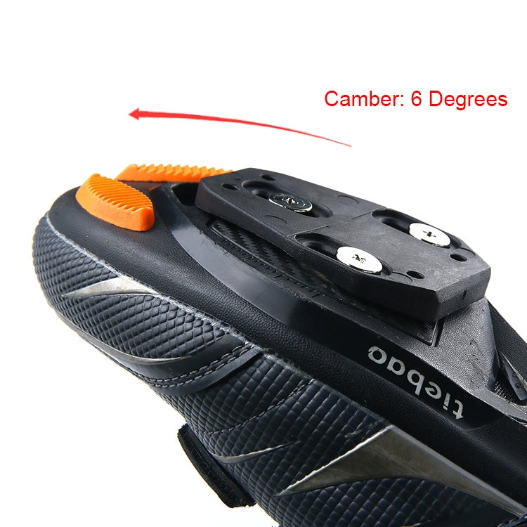 Close-up of black cycling shoe cleat plate with mounting holes
