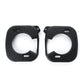 Pair of black textured cycling cleat covers with small mounting tabs
