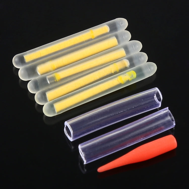 Luminous night fishing light sticks in clear tubes, yellow glow and one red glow stick