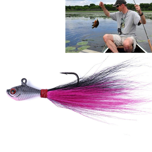 Grey artificial fishing lure with purple feather skirt, red tie, treble hook