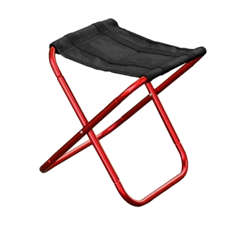 Portable folding stool with red metal frame and black fabric seat.