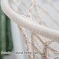 Natural beige rope weave hanging swing chair with knotted crosshatch net and fringe