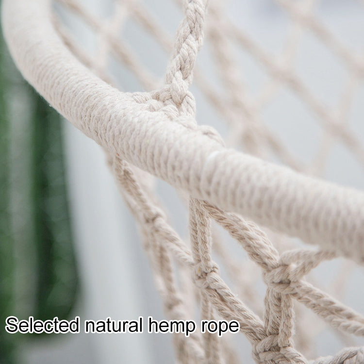 Natural beige rope weave hanging swing chair with knotted crosshatch net and fringe