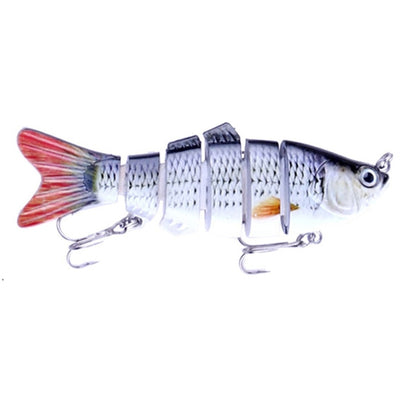 Multi-section hard plastic fishing lure in silver with red tail and treble hooks