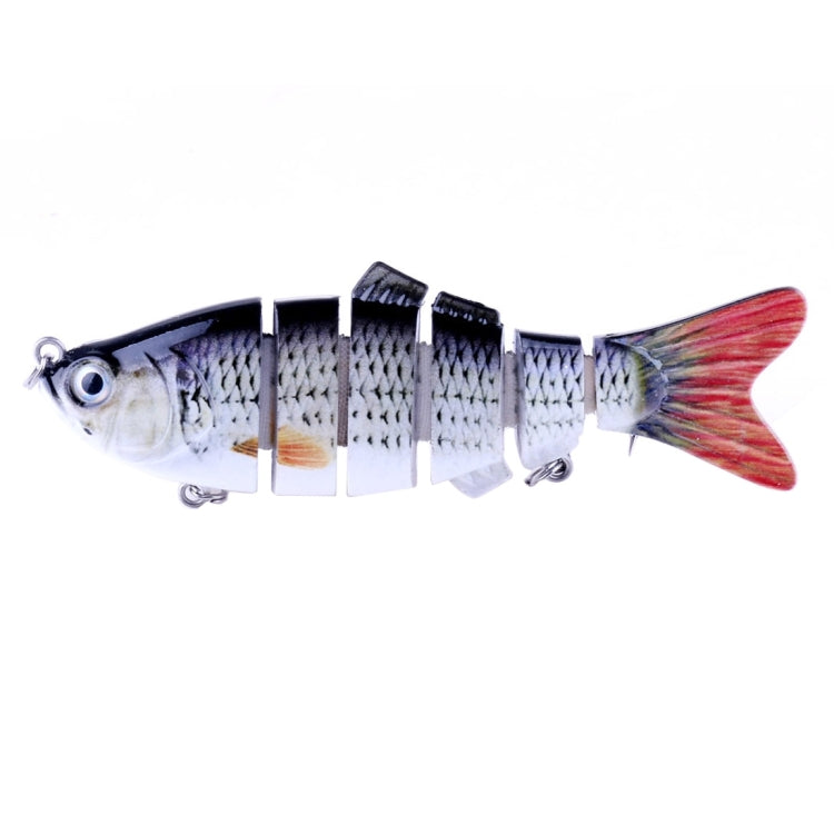 Multi-section hard plastic fishing lure, silver-white body with red tail and treble hooks