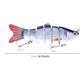 Multi-section hard plastic fishing lure with silver body, red tail, and three treble hooks