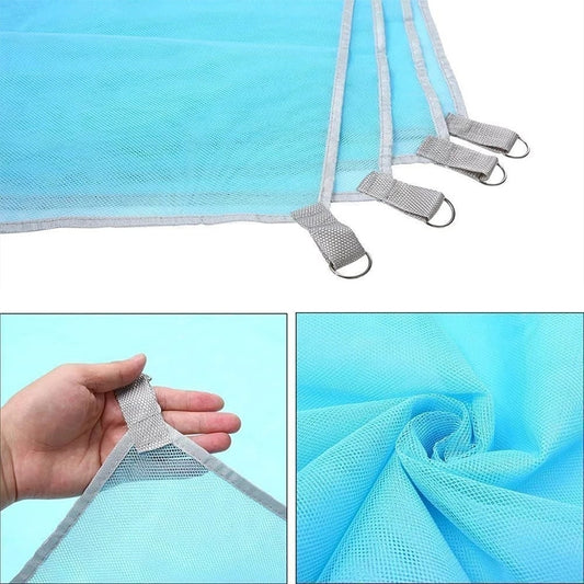 Light blue sand-free beach mat with gray webbing straps on folded edge