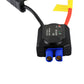 Close-up of black control module with blue ports on booster cable set