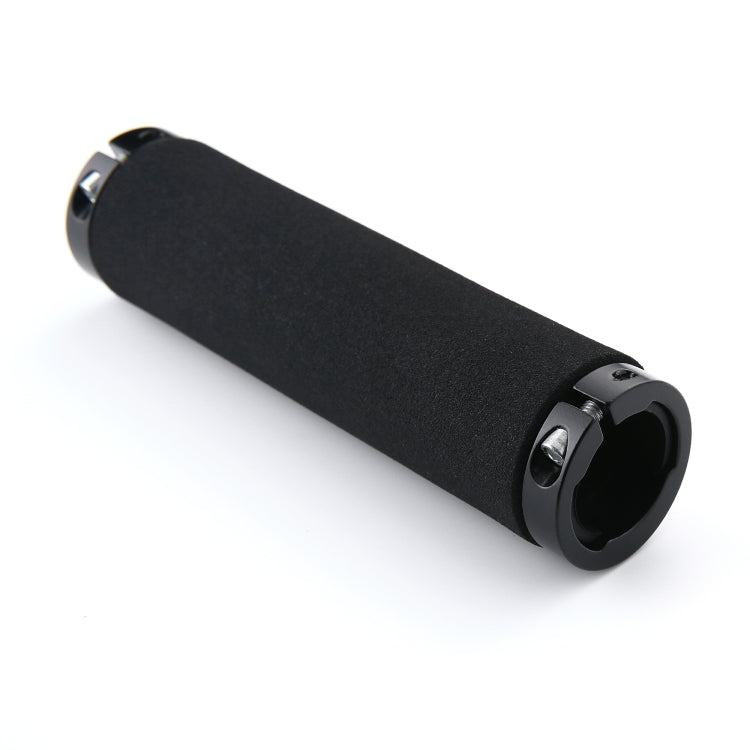 Black sponge bicycle handlebar grips with alloy lock rings, angled view