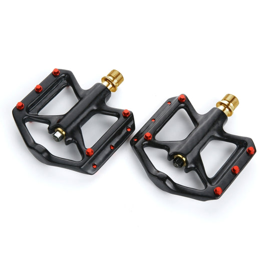 Road bike flat pedals, pair; black platforms with gold axle bolts and red corner screws