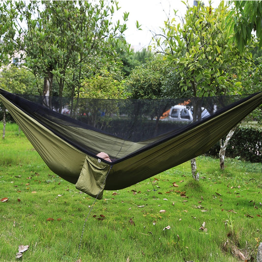 Army green parachute hammock with black mosquito net, open ends and hanging pouch