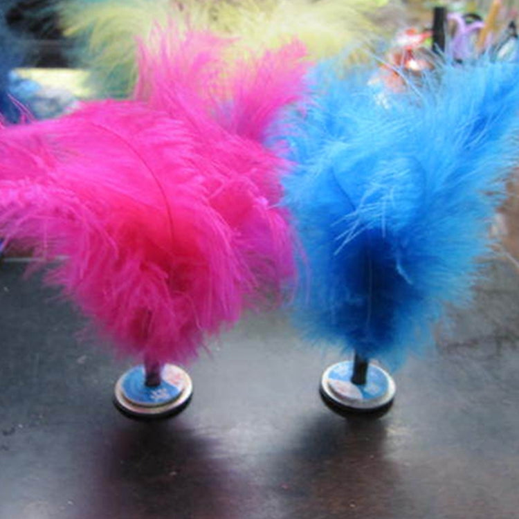 Pair of feather kick shuttlecocks with pink and blue plumes on round suction-style bases